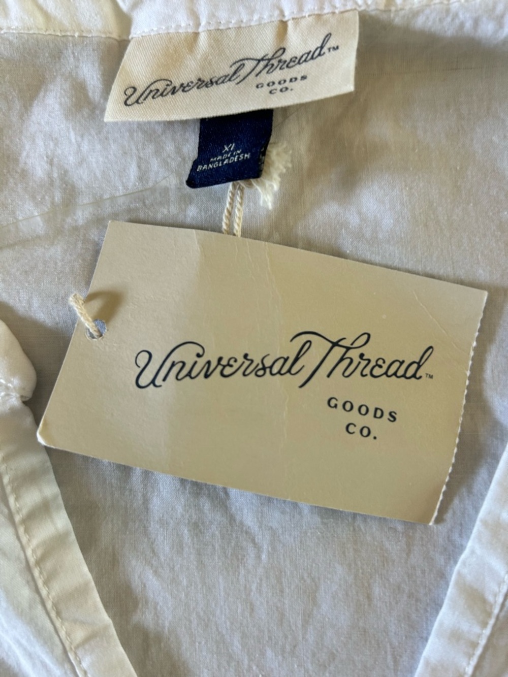 White Peasant Blouse with V-Neck
Universal threads NWT - Picture 2 of 5